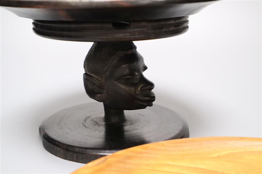 A burr yew bowl by Peter Spear, a carved hardwood stand and an ebony dish